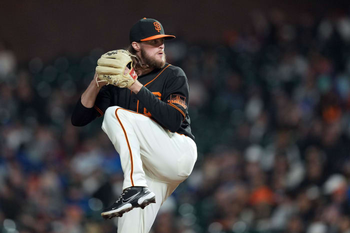 SF Giants relief pitcher Cole Waites throws a pitch against the Los Angeles Dodgers. (2022)